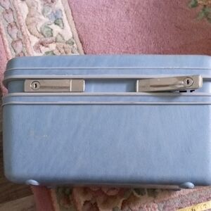 Samsonite Light Blue Suitcase with Silver Accents